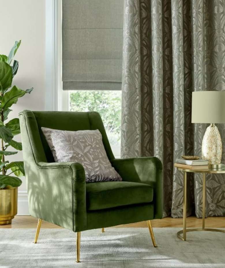 Blinds design with green sofa
