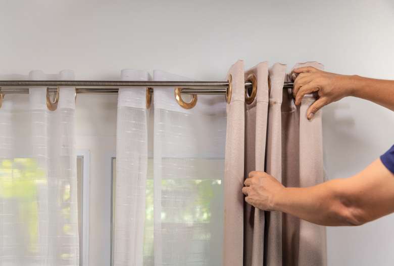 Installing blackout curtain