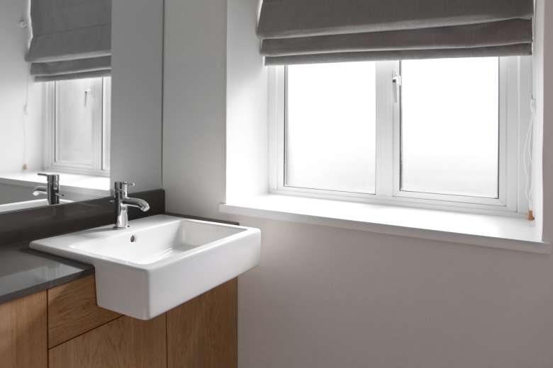 Roller bathroom window treatment